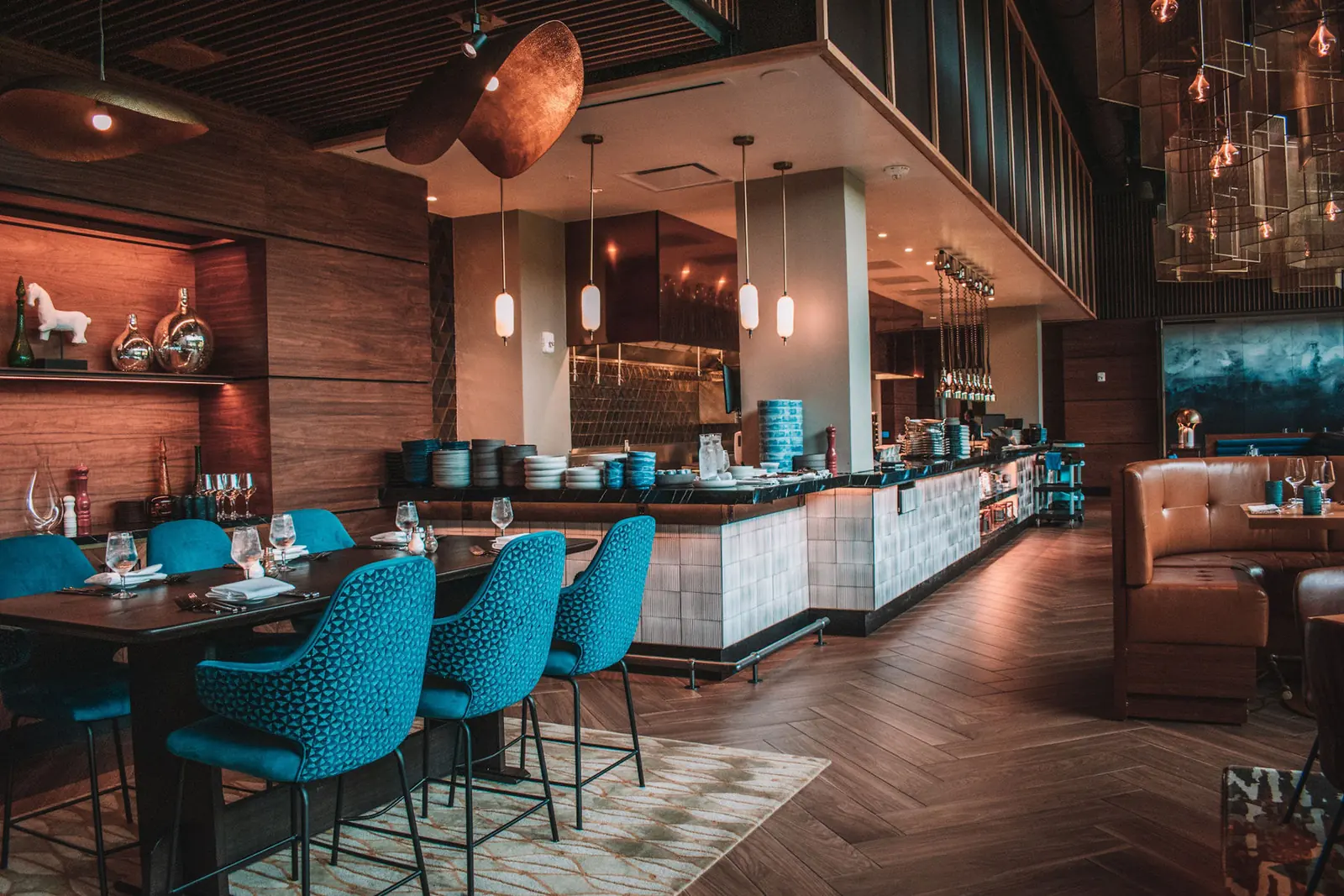 Restaurant with patterned hardwood and tile installed by AJ Flooring