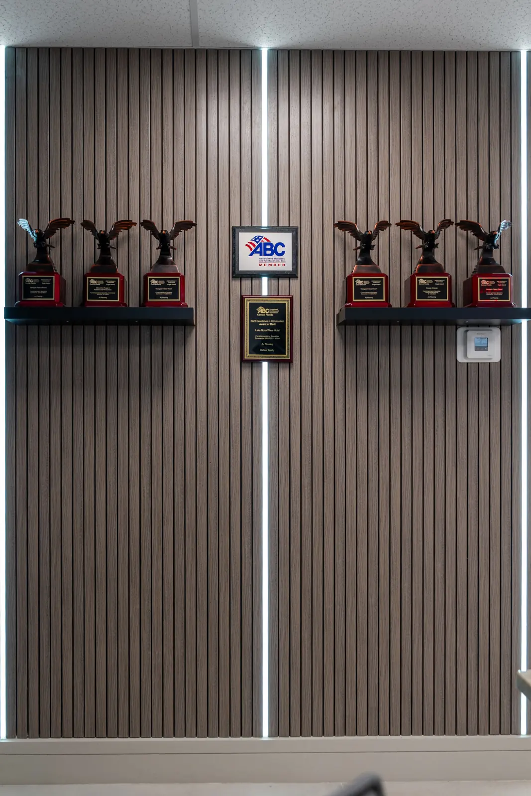 ABC awards displayed at the AJ Flooring office